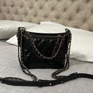Black leather bag with chain strap crossbody